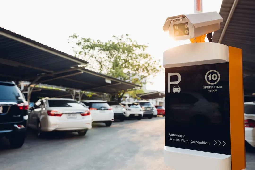 Automatic licence-plate-recognition camera at a parking lot entrance